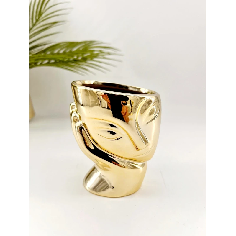 Visage décoratif en céramique