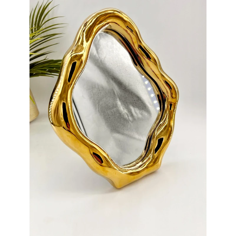 Miroir à poser avec bordure dorée, design tendance