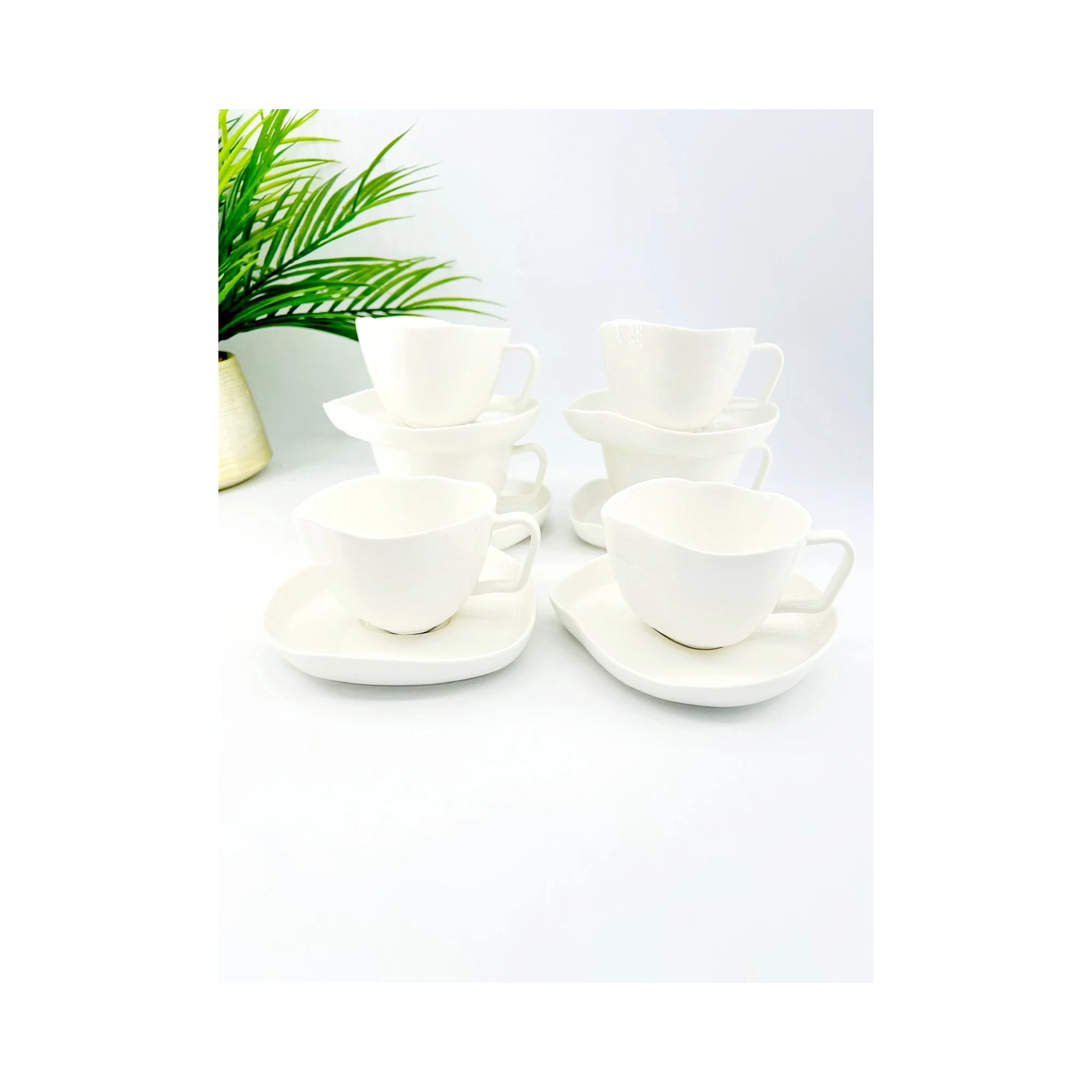Service de 6 tasses et sous-tasses au design ondulé en porcelaine blanche